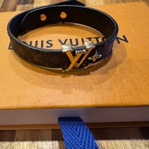 Louis Vuitton Black Leather Bracelet with Gold Logo